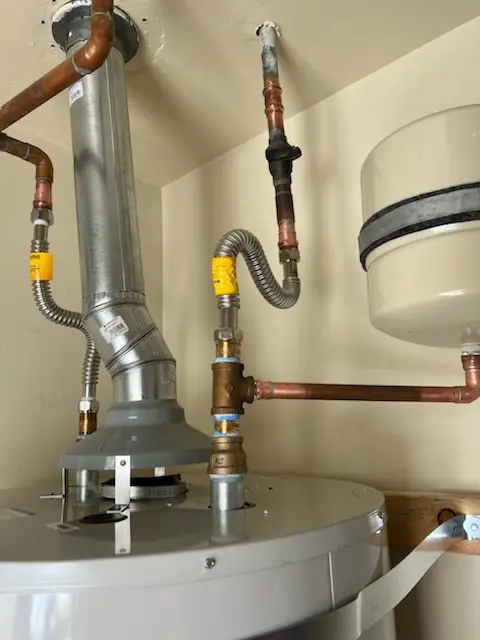 Water heater installation and plumbing repair in Elmville